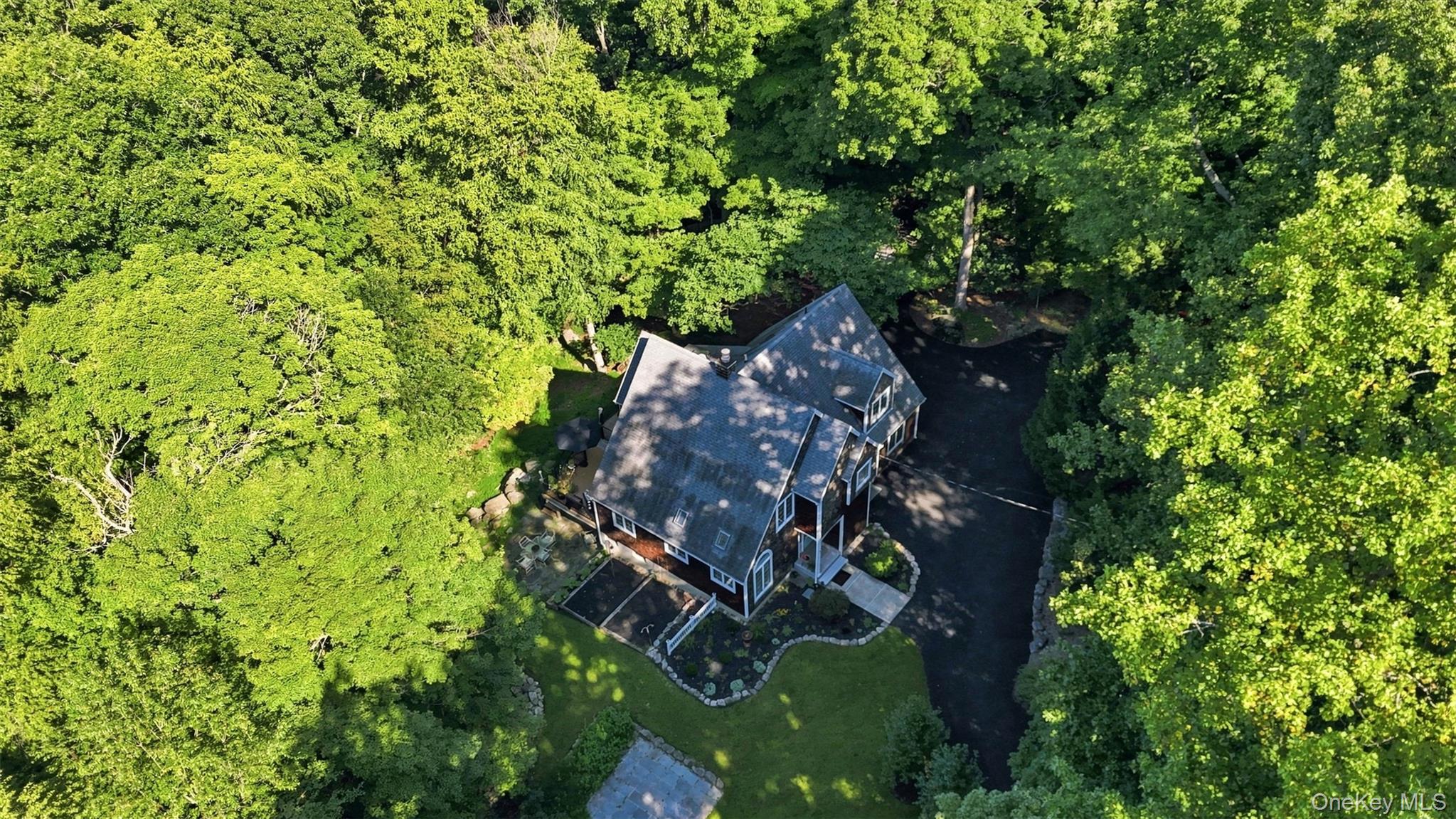 45 Chardavoyne Road Warwick, NY 10990 - Photo 4 of 43 Aerial view of home surrounded by mature woods