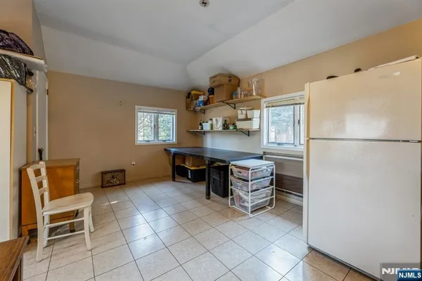 a room with furniture a desk and chair