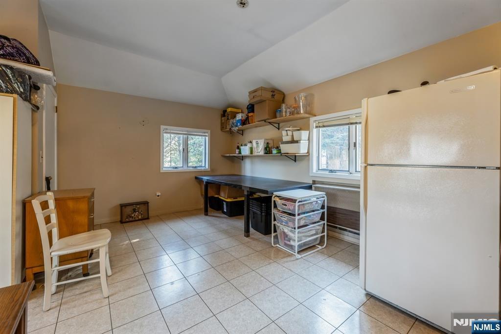 58 Taillon Terrace Closter, NJ 07624 - Photo 11 of 24 a room with furniture a desk and chair