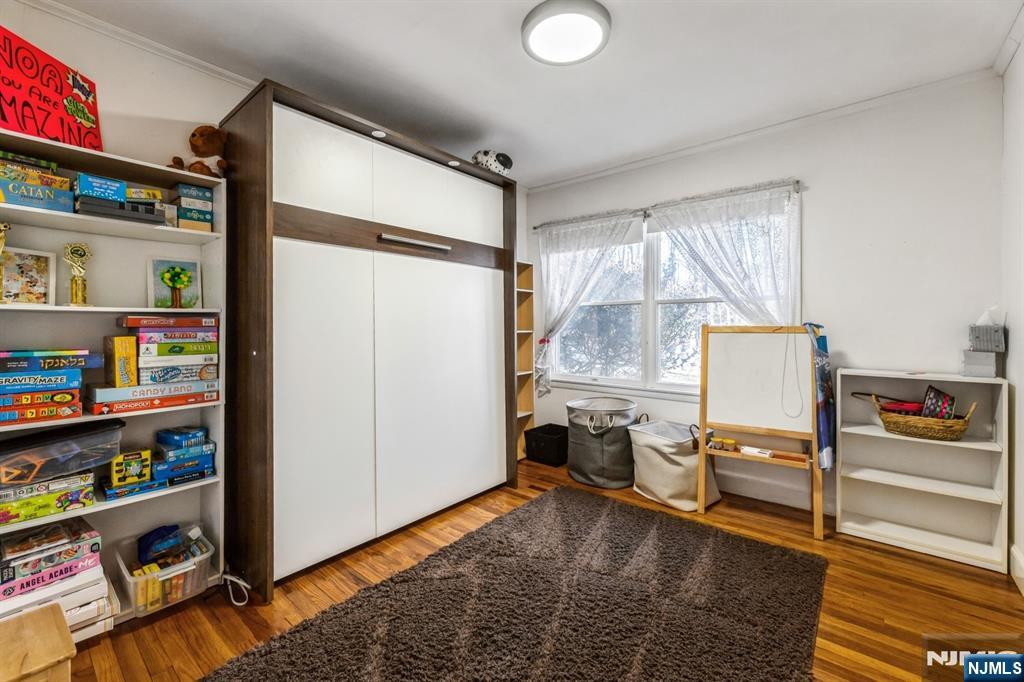 58 Taillon Terrace Closter, NJ 07624 - Photo 14 of 24 a living room with furniture and a window