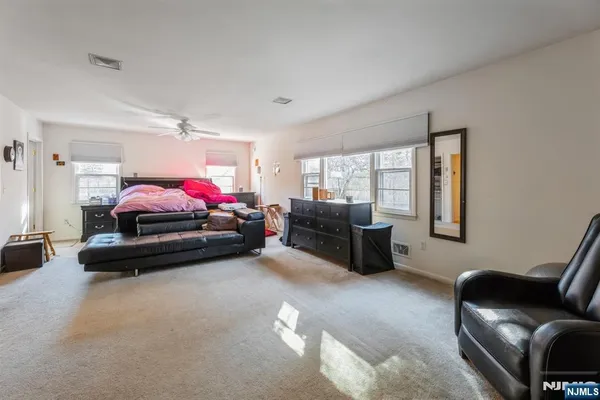 a living room with furniture and a couch