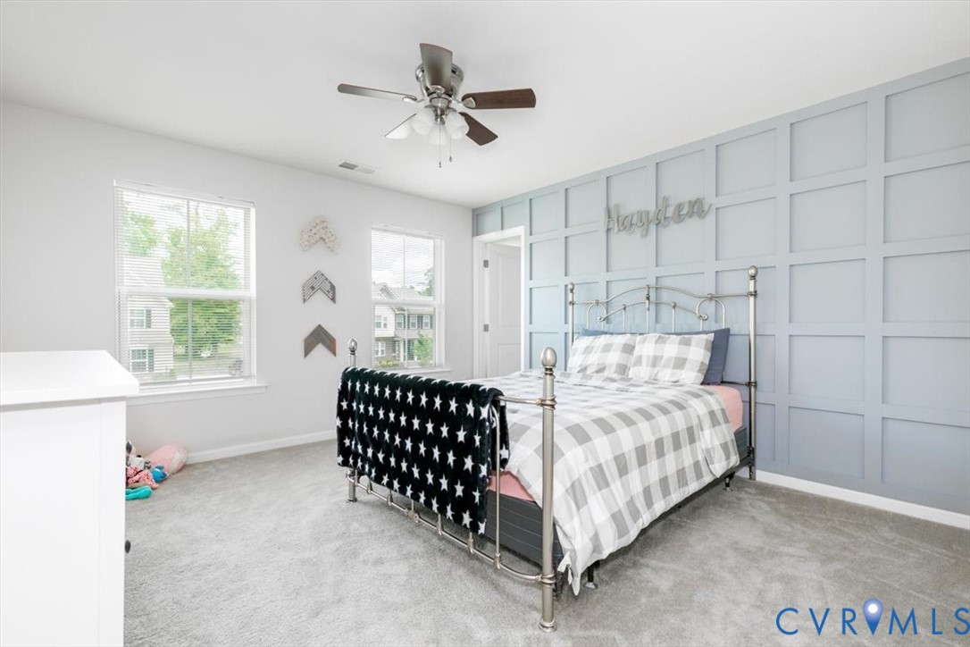 10430 Eagle Court Hopewell, VA 23860 - Photo 24 of 45 a bedroom with a bed and window