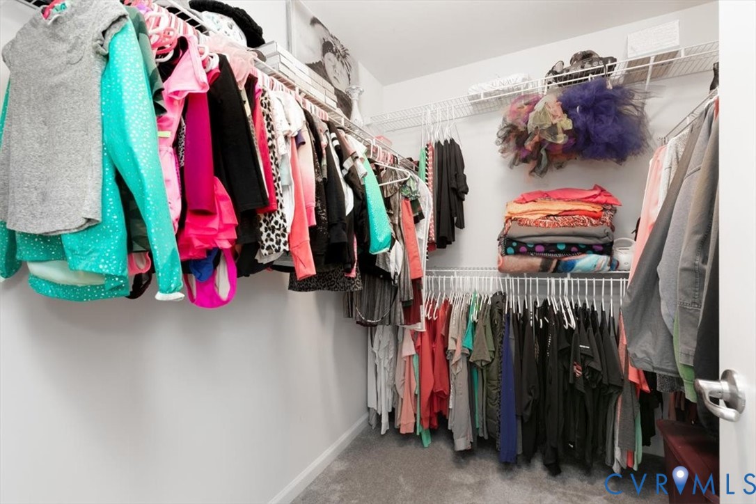 10430 Eagle Court Hopewell, VA 23860 - Photo 30 of 45 a view of walk in closet with clothes