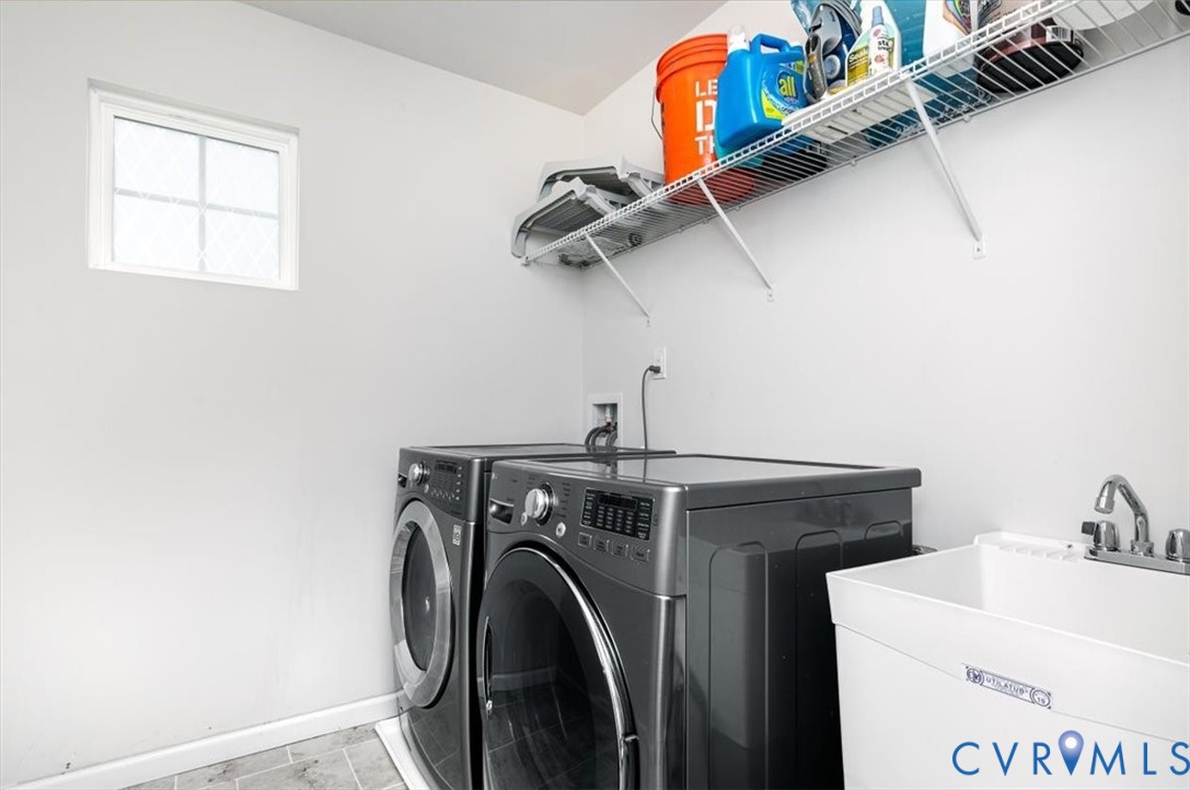10430 Eagle Court Hopewell, VA 23860 - Photo 38 of 45 a utility room with dryer and washer