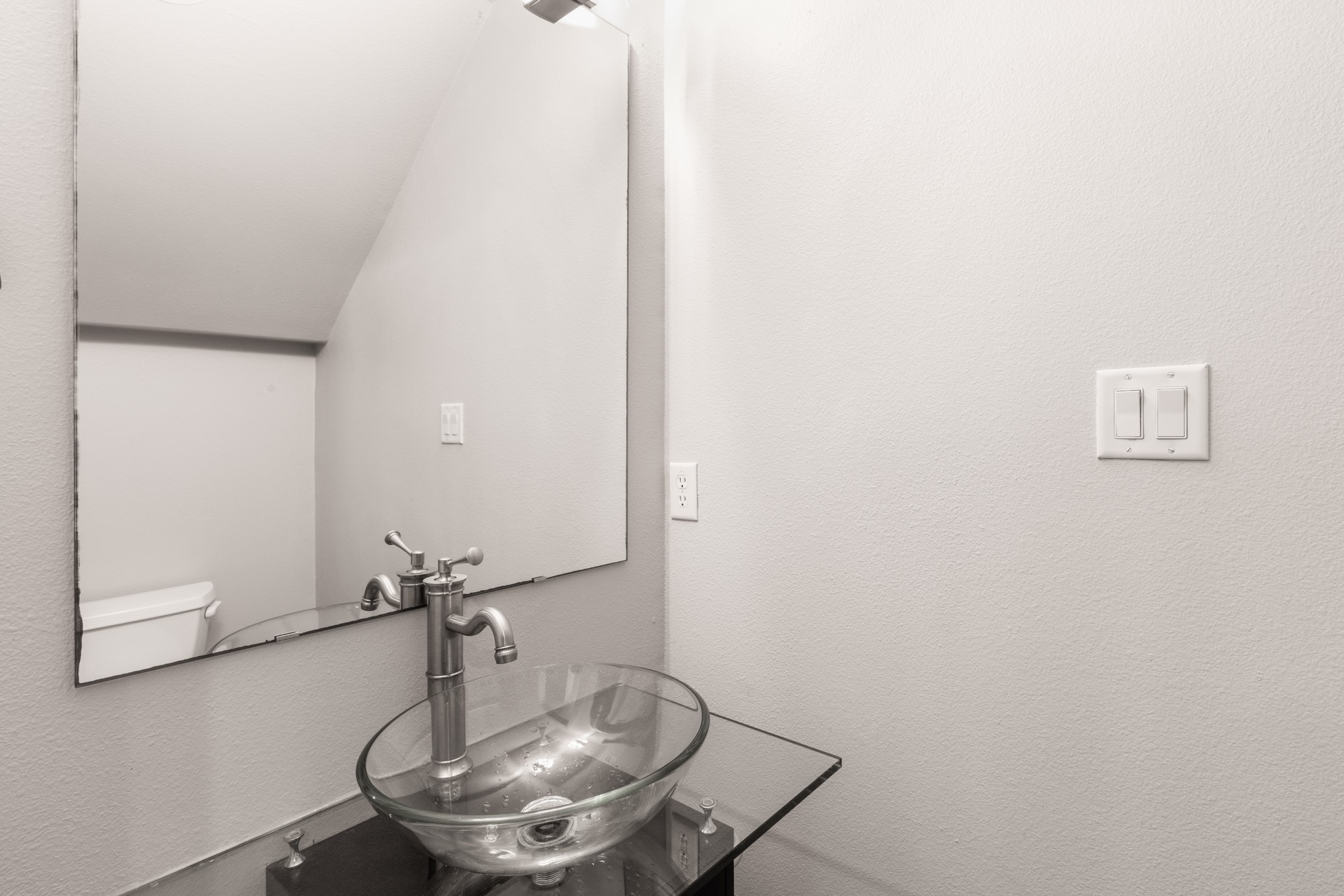2310 Thornton Road, Unit A Austin, TX 78704 - Photo 15 of 32 a bathroom with a sink and mirror