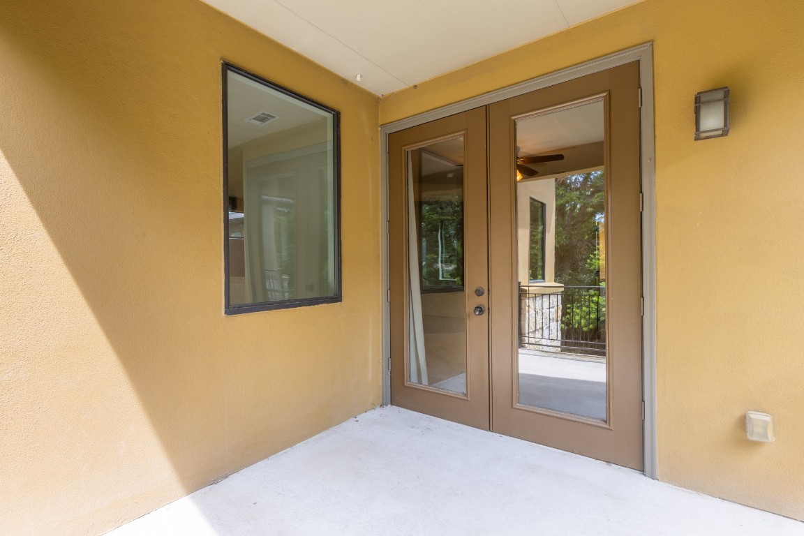 2310 Thornton Road, Unit A Austin, TX 78704 - Photo 28 of 32 a view of a hallway with a livingroom and front door