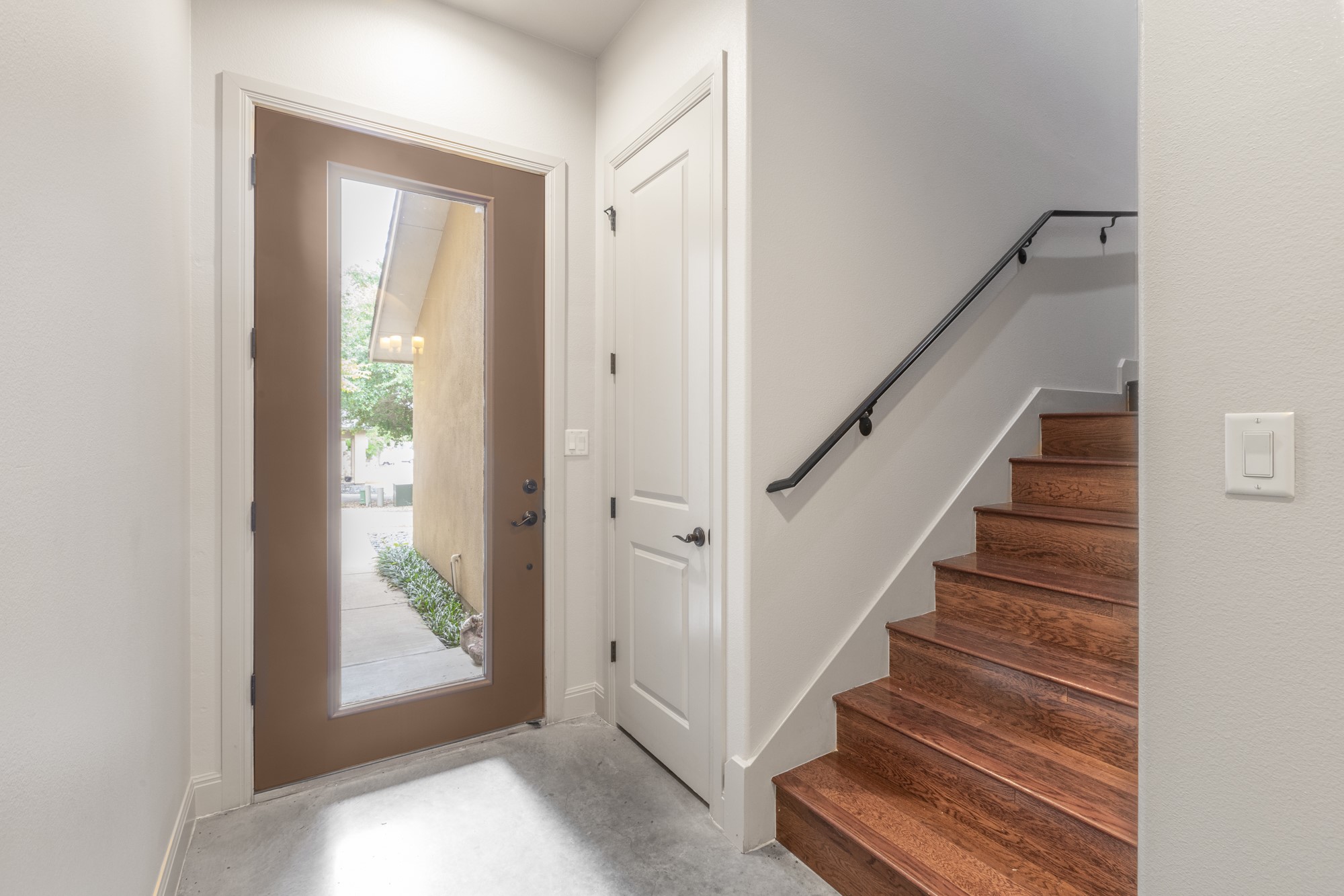 2310 Thornton Road, Unit A Austin, TX 78704 - Photo 3 of 32 a view of entryway with wooden floor and stair