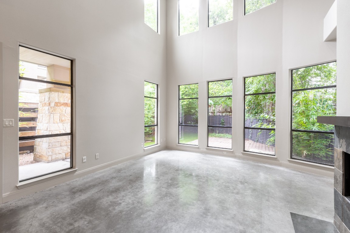 2310 Thornton Road, Unit A Austin, TX 78704 - Photo 9 of 32 a view of an empty room with a window and balcony view