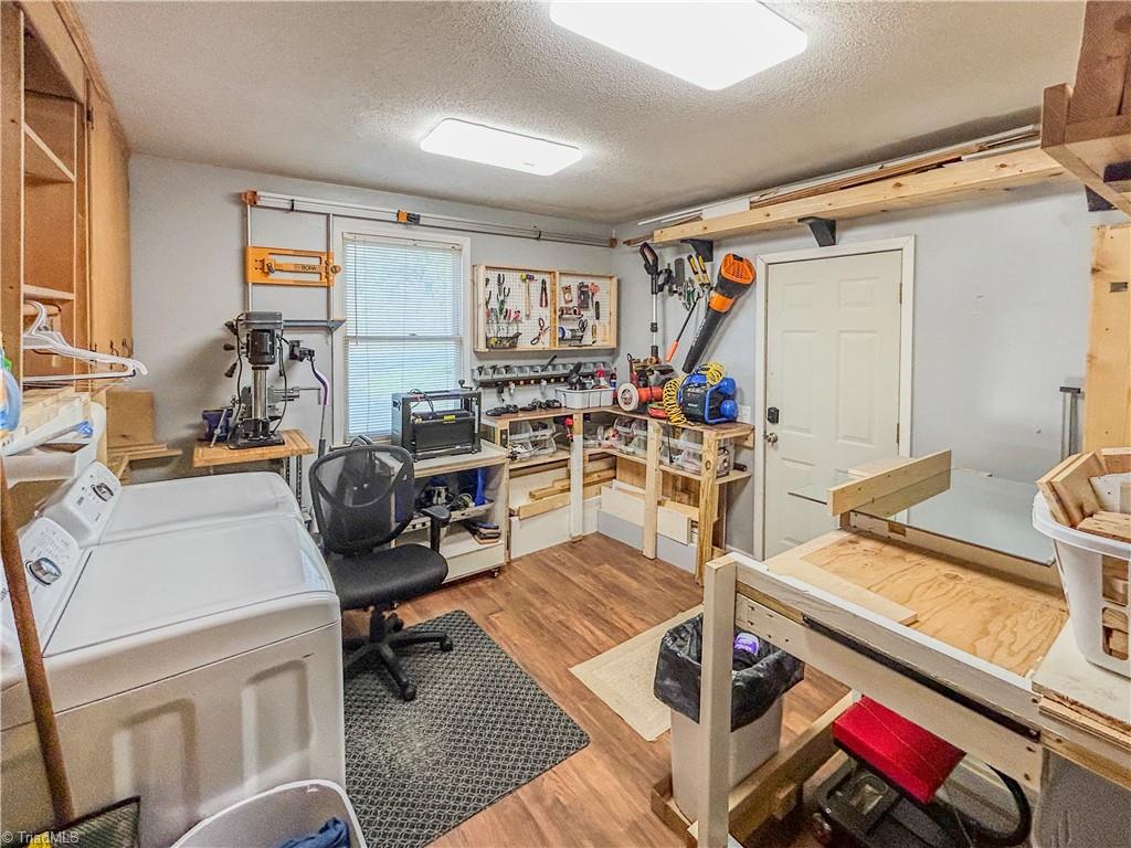 805 Spring Street Reidsville, NC 27320 - Photo 10 of 23 Laundry room/workshop off of dining room