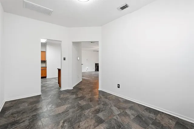 a view of a room with an empty space