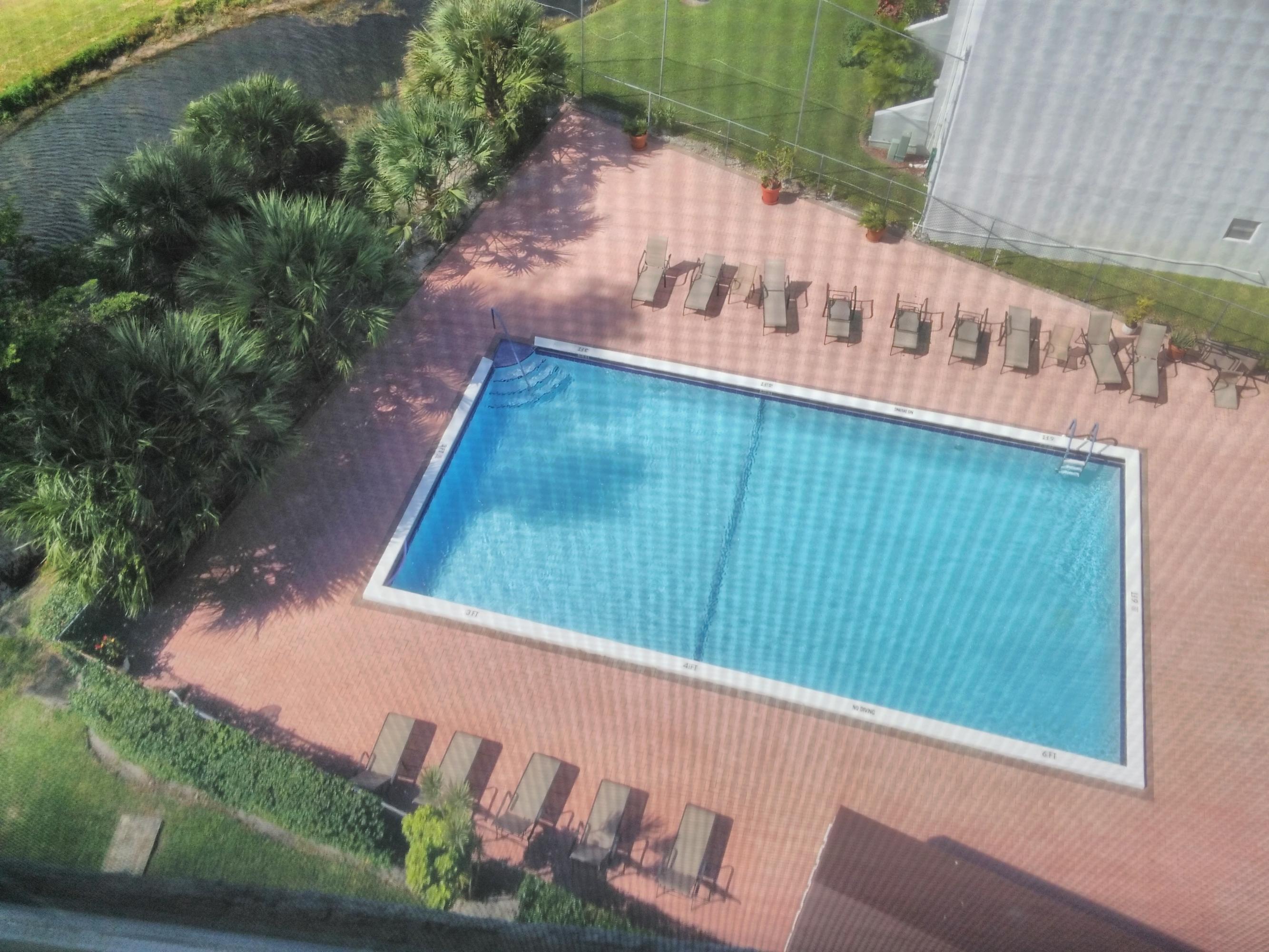 3465 Via Poinciana, Unit 806 Lake Worth, FL 33467 - Photo 18 of 22 a view of a street with an ocean view