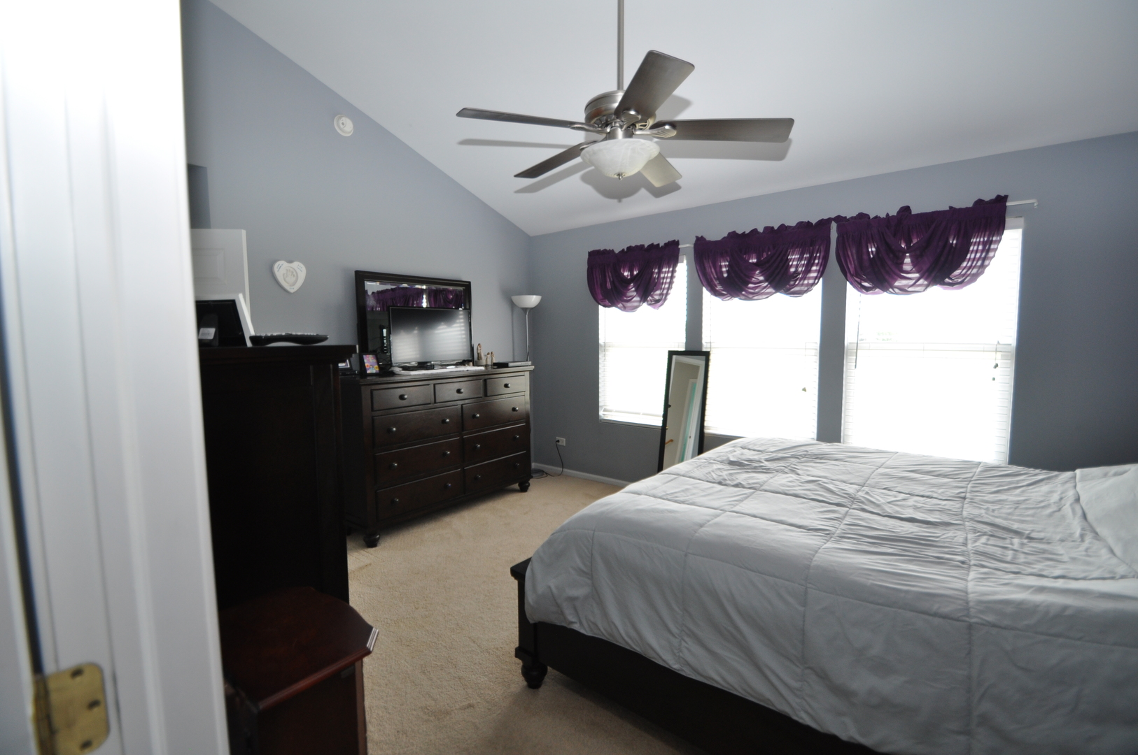 25056 Spring Street Manhattan, IL 60442 - Photo 14 of 24 a bedroom with a bed and a window