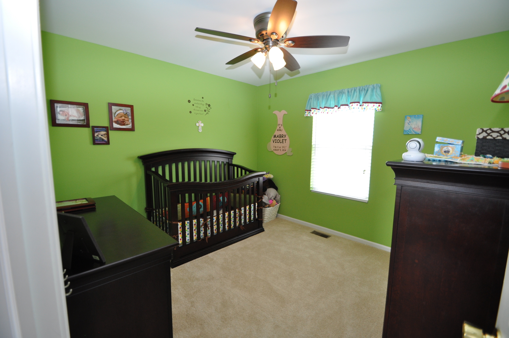 25056 Spring Street Manhattan, IL 60442 - Photo 17 of 24 a bedroom with a bed and a window