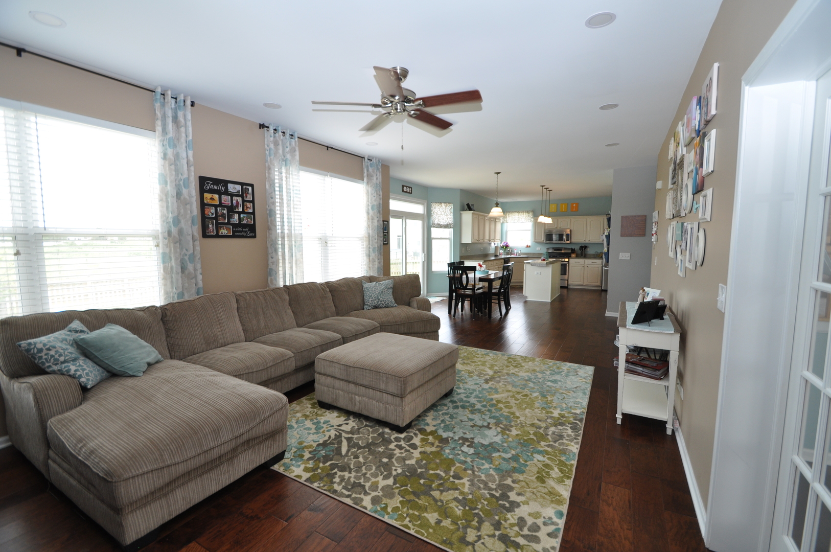 25056 Spring Street Manhattan, IL 60442 - Photo 4 of 24 a living room with furniture and a large window