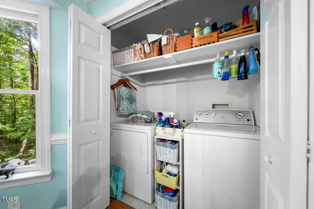 a utility room with dryer and washer
