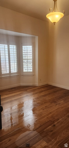 552 Sunset Crest Way Draper, UT 84020 - Photo 19 of 68 Unfurnished room featuring dark wood finished floors and baseboards