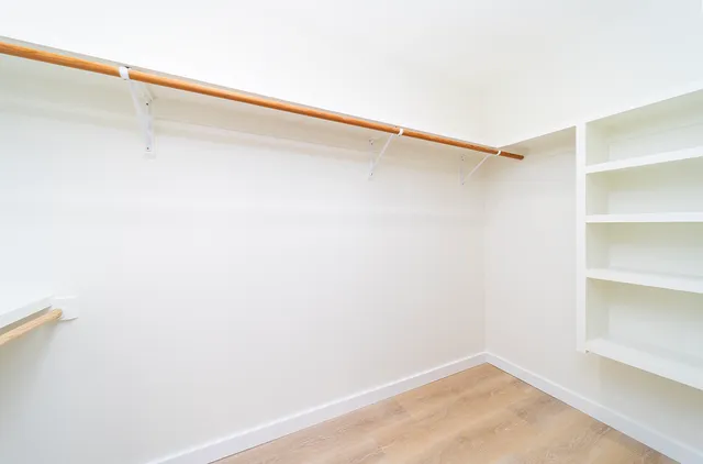 a view of small space with racks on the wall