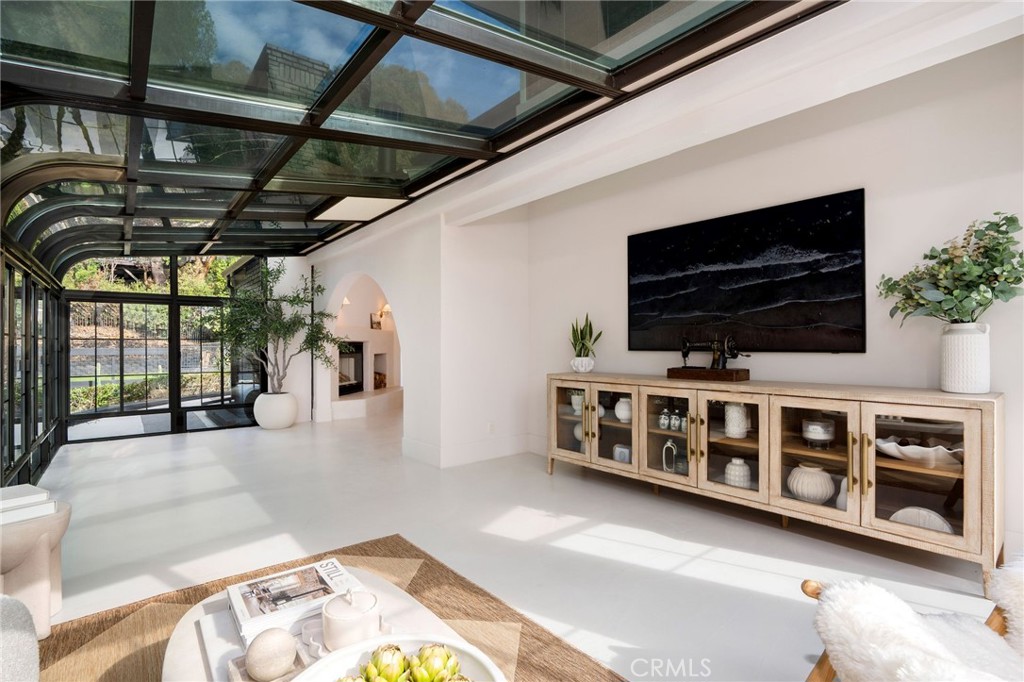 23229 8th Street Newhall, CA 91321 - Photo 22 of 52 a living room with furniture and a flat screen tv
