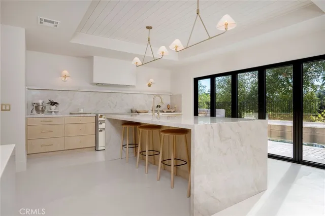 a view of cabinets and window