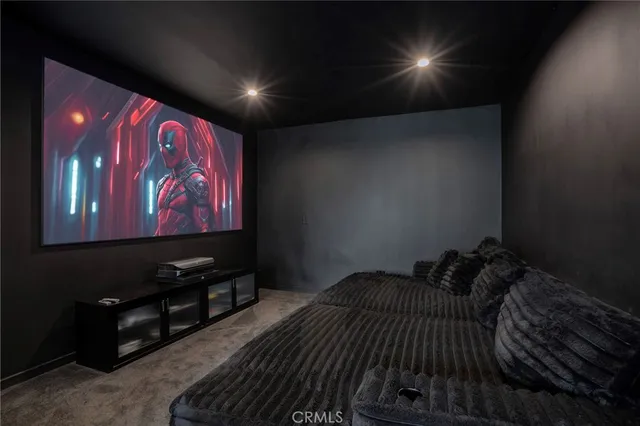 a bed room with a bed and a white wall