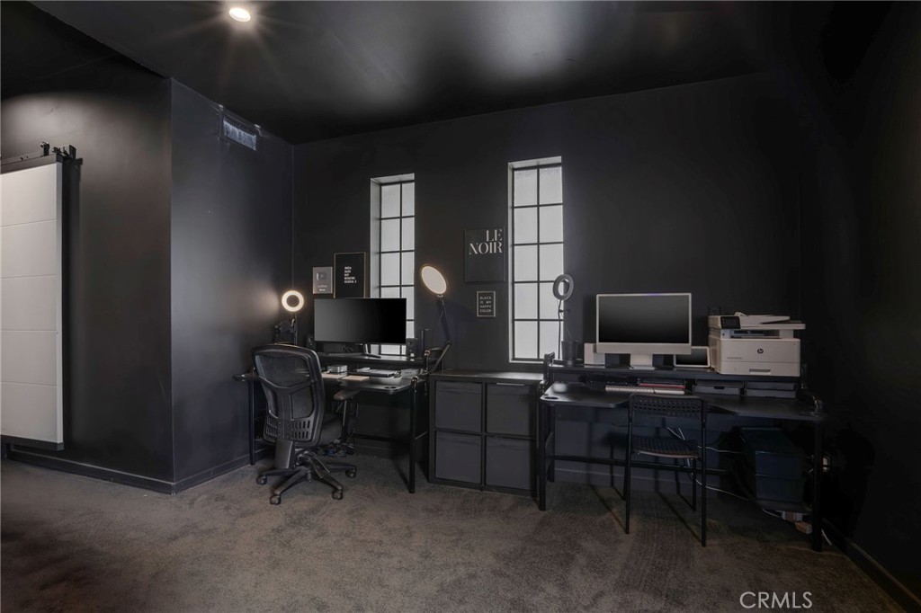 23229 8th Street Newhall, CA 91321 - Photo 35 of 52 a view of a workspace with furniture