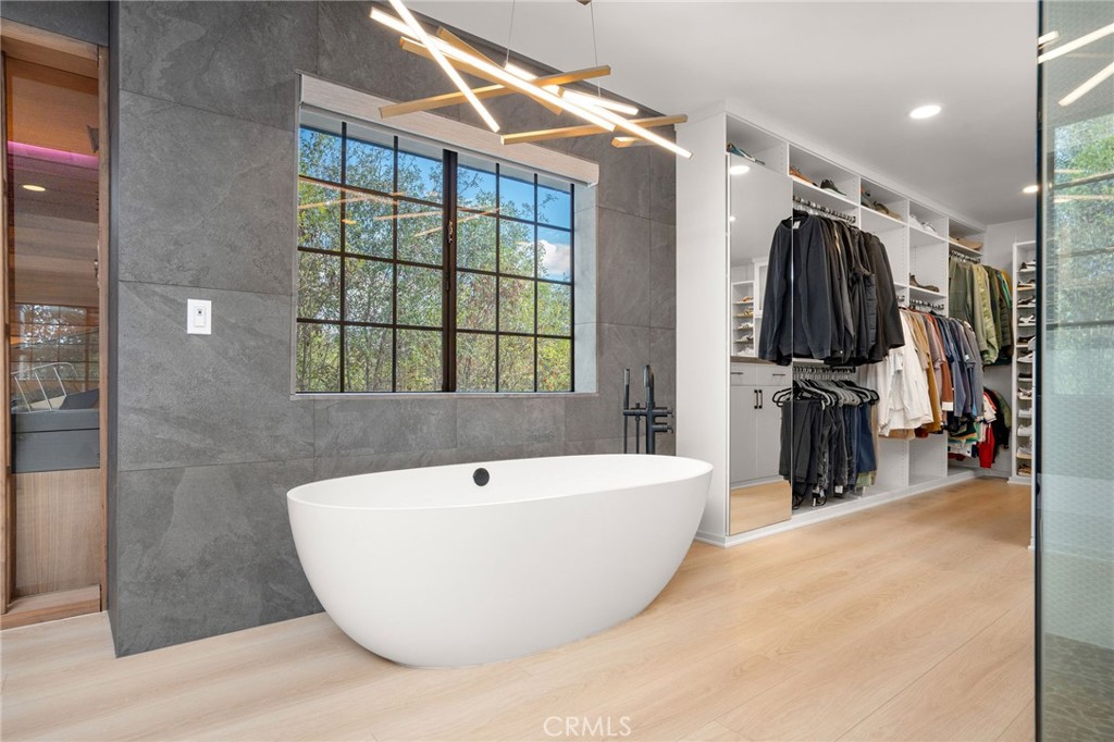 23229 8th Street Newhall, CA 91321 - Photo 42 of 52 a view of a bathtub in a bathroom