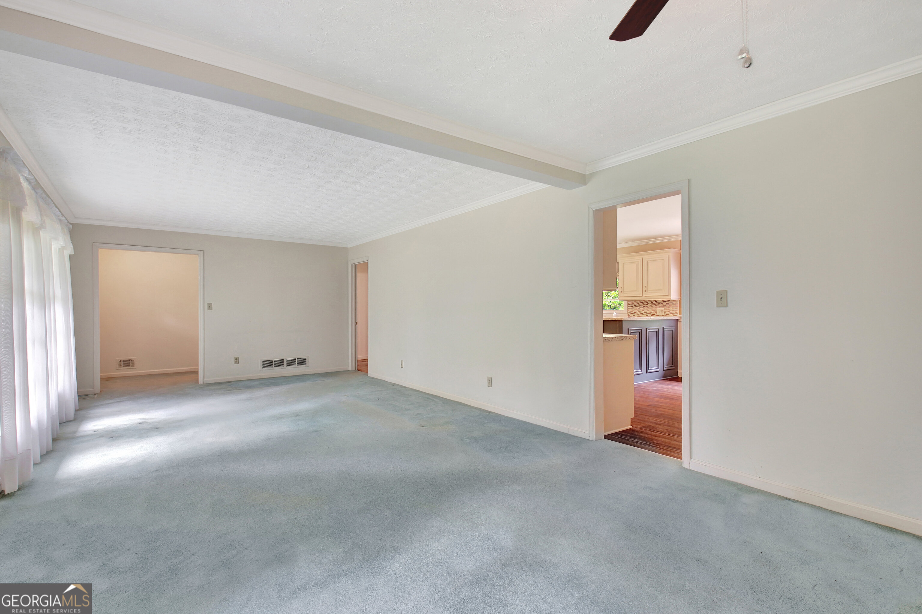 717 Tyrone Road Tyrone, GA 30290 - Photo 15 of 58 a view of an empty room and a window