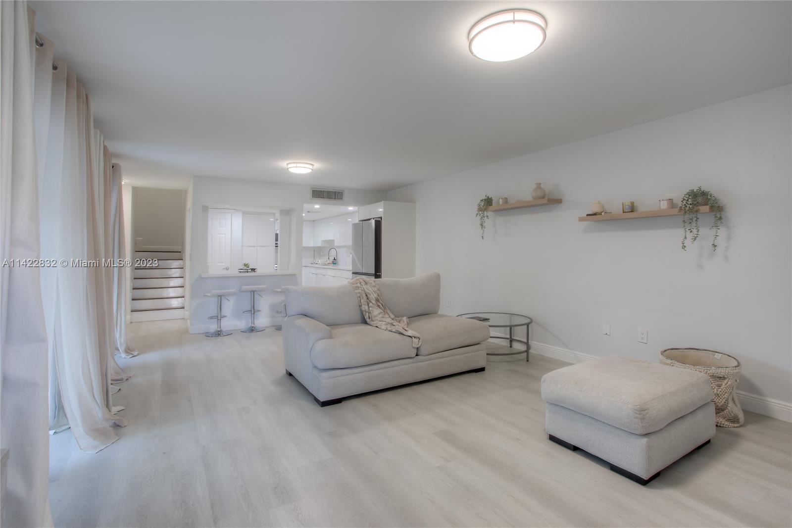 14332 Southwest 97th Lane Miami, FL 33186 - Photo 3 of 15 a living room with furniture