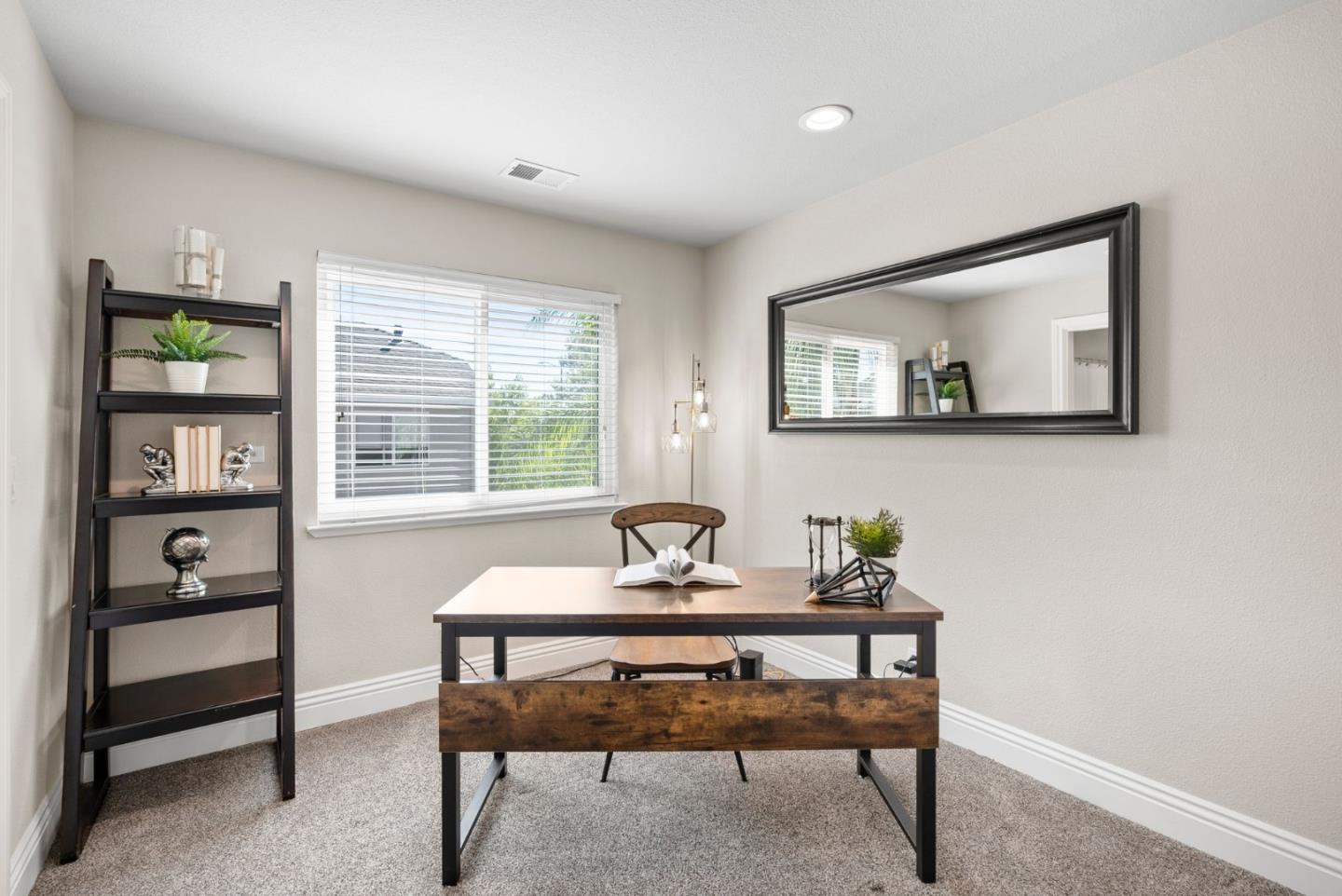 9310 Hirasaki Avenue Gilroy, CA 95020 - Photo 26 of 30 a living room with furniture and a window