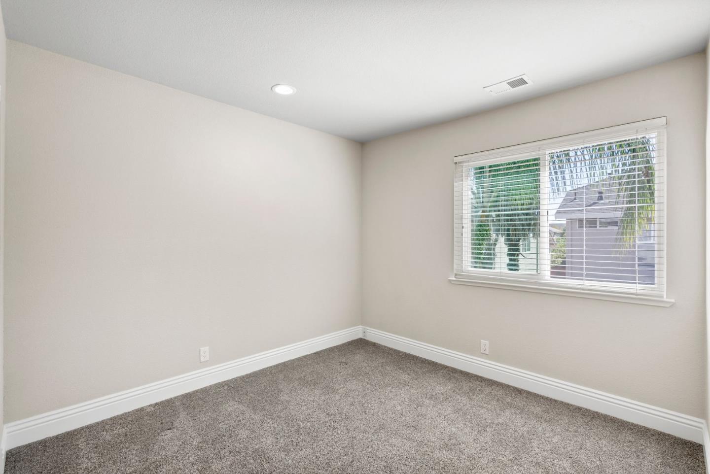 9310 Hirasaki Avenue Gilroy, CA 95020 - Photo 28 of 30 an empty room with a window