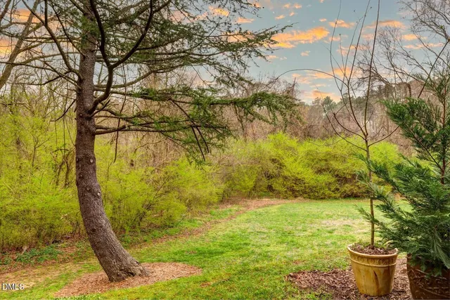 a view of swimming pool from a lake view