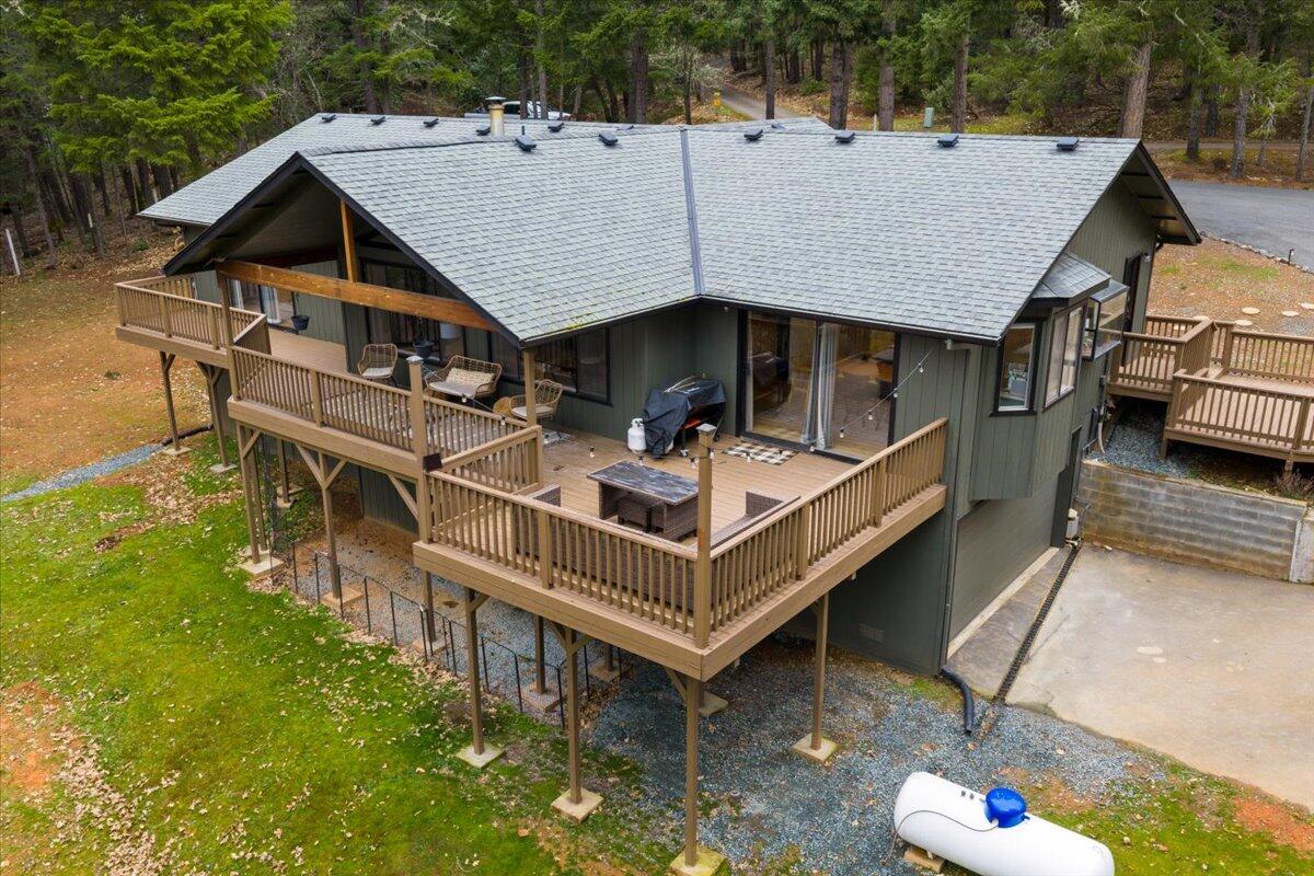 350 Splendor Drive Wilderville, OR 97543 - Photo 43 of 57 a aerial view of a house with swimming pool and sitting area