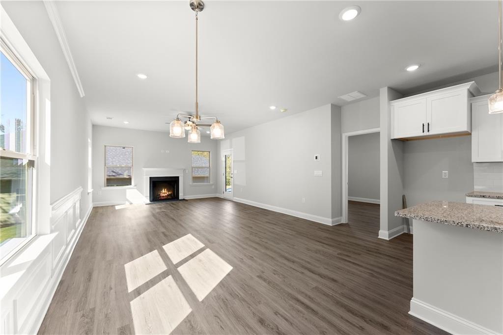 285 Magnolia Villas Drive Cornelia, GA 30531 - Photo 13 of 49 a view of a kitchen with wooden floor and a kitchen