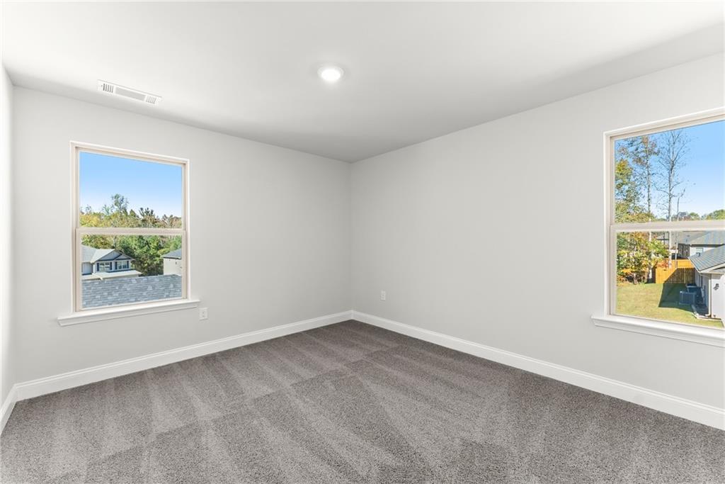 285 Magnolia Villas Drive Cornelia, GA 30531 - Photo 29 of 49 an empty room with windows