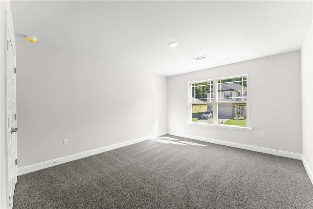 285 Magnolia Villas Drive Cornelia, GA 30531 - Photo 34 of 49 an empty room with windows
