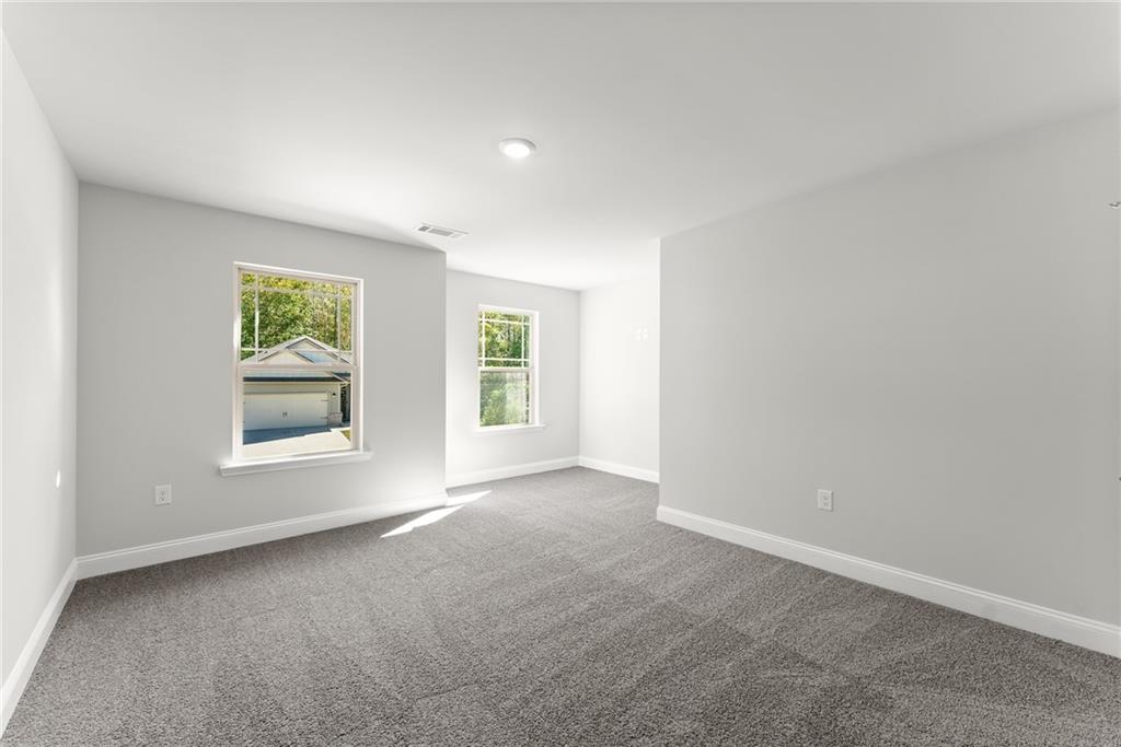 285 Magnolia Villas Drive Cornelia, GA 30531 - Photo 36 of 49 an empty room with windows