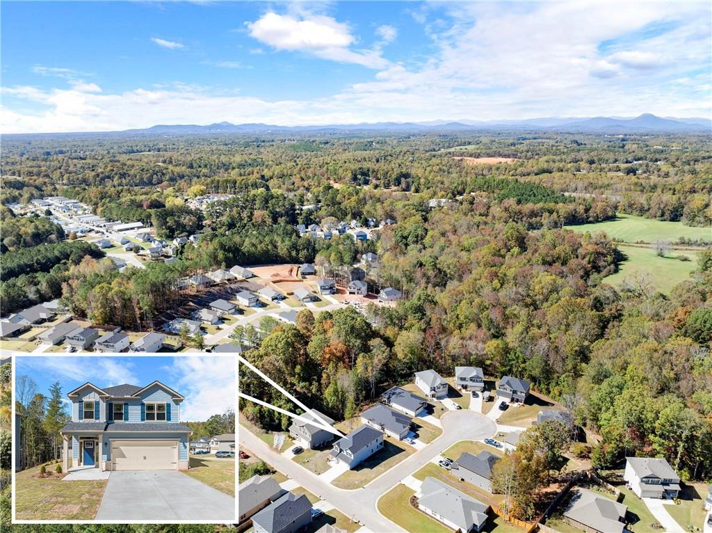 285 Magnolia Villas Drive Cornelia, GA 30531 - Photo 45 of 49 an aerial view of multiple house