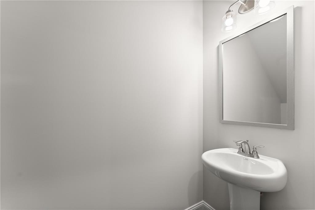 285 Magnolia Villas Drive Cornelia, GA 30531 - Photo 7 of 49 a bathroom with a sink and a mirror