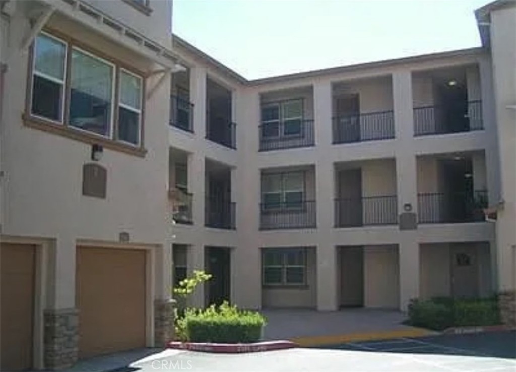 12400 Fair Oaks Boulevard, Unit 132 Fair Oaks, CA 95628 - Photo 1 of 1 a front view of a multi story building