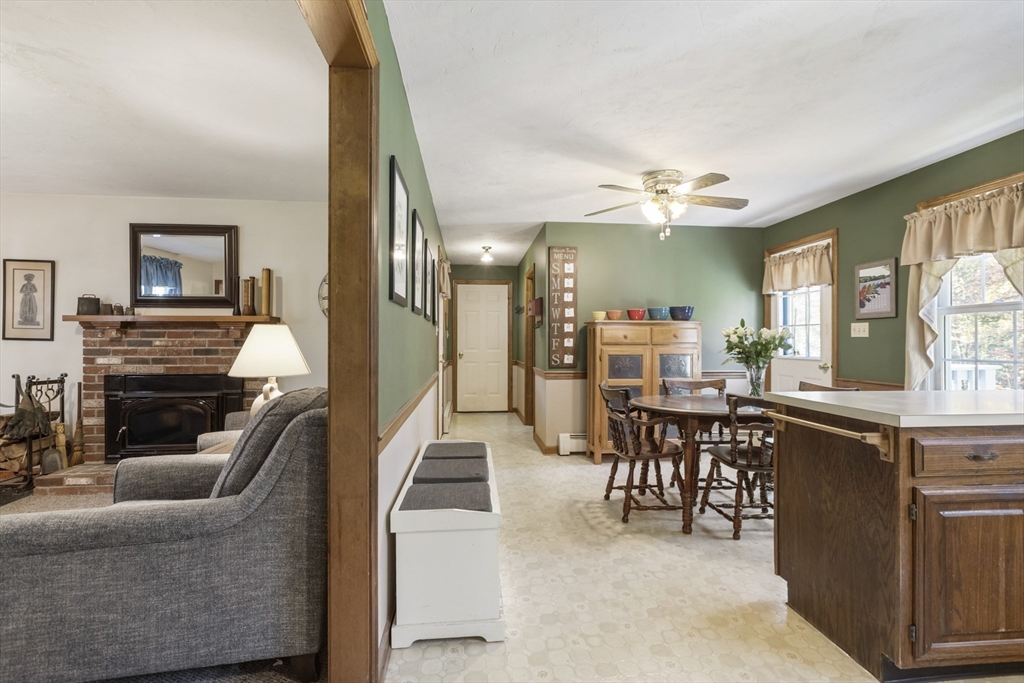 103 Uxbridge Street Douglas, MA 01569 - Photo 17 of 38 a view of a livingroom with furniture and a piano