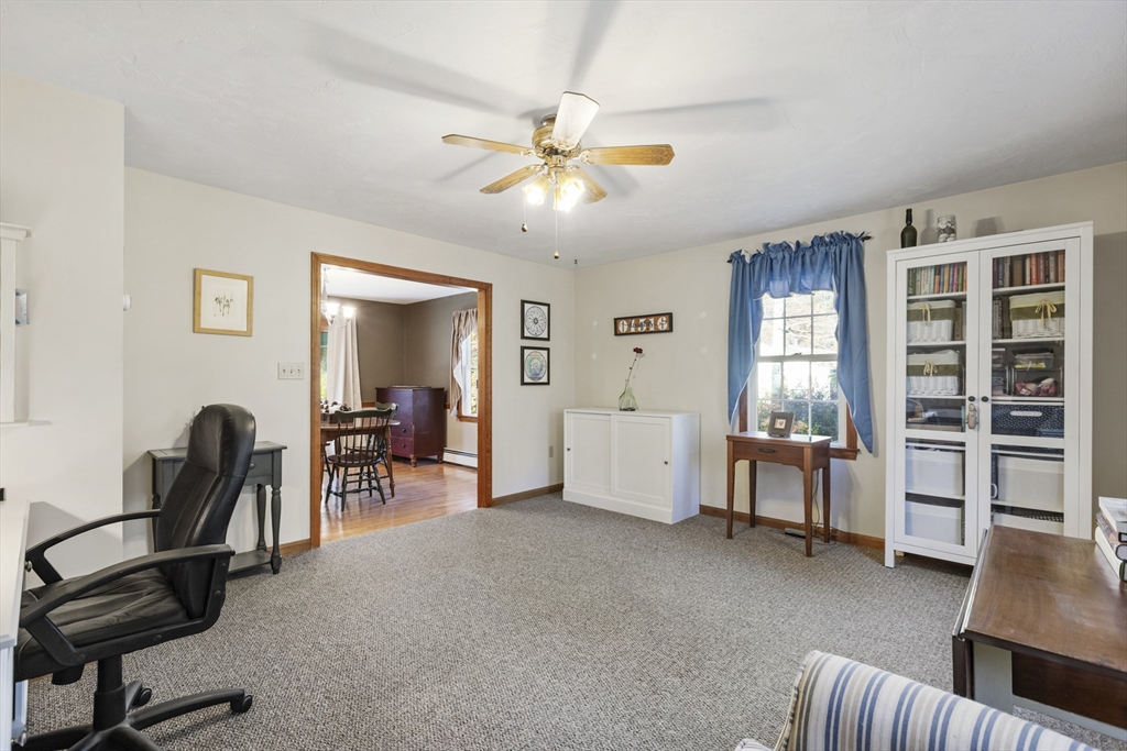 103 Uxbridge Street Douglas, MA 01569 - Photo 22 of 38 a view of a livingroom with furniture and a window