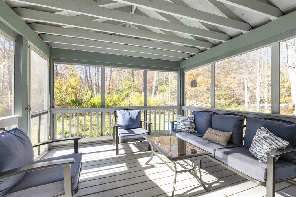 103 Uxbridge Street Douglas, MA 01569 - Photo 28 of 38 a living room with furniture and a large window