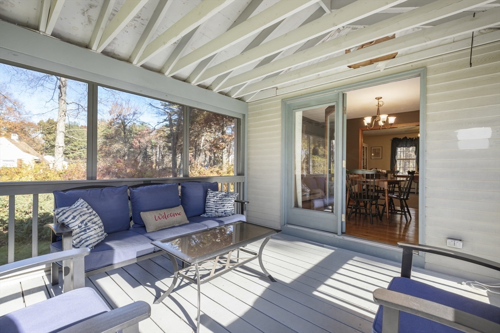 103 Uxbridge Street Douglas, MA 01569 - Photo 29 of 38 a living room with furniture and wooden floor