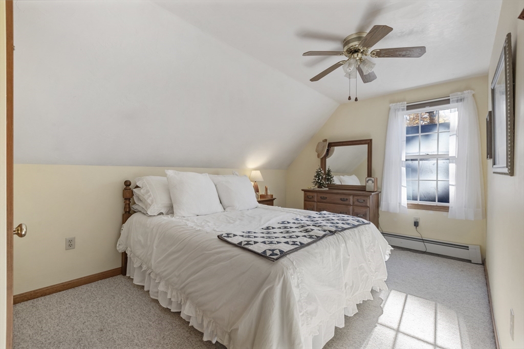 103 Uxbridge Street Douglas, MA 01569 - Photo 31 of 38 a bedroom with a large bed and a window
