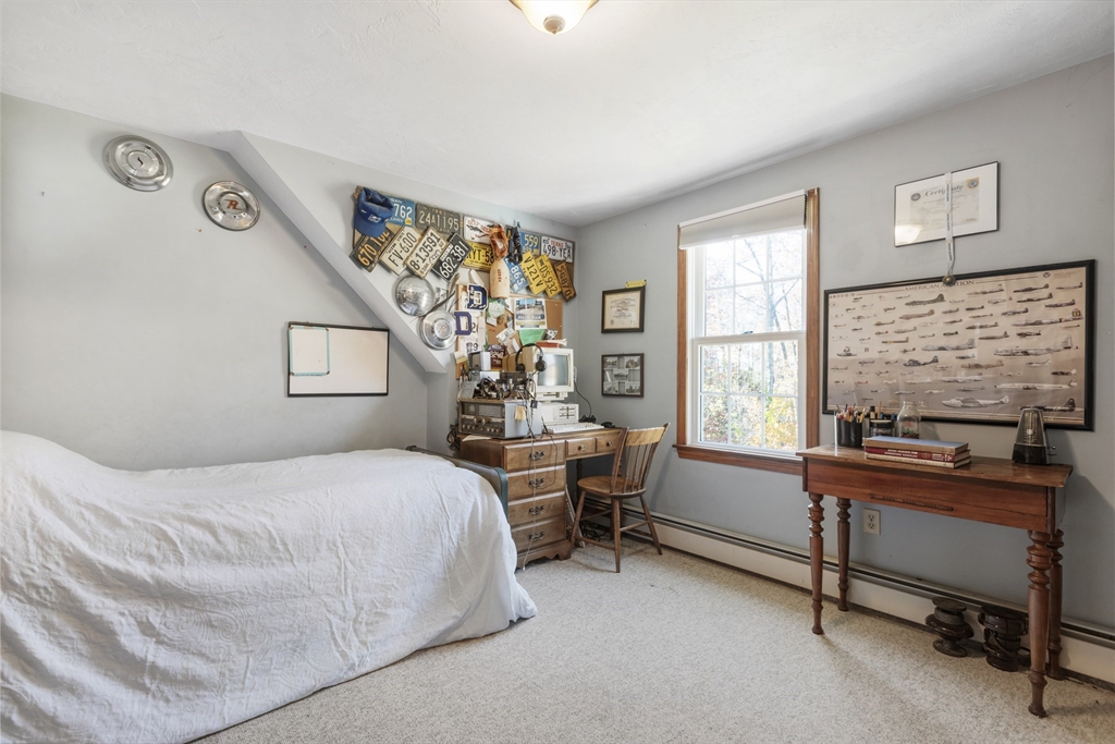 103 Uxbridge Street Douglas, MA 01569 - Photo 38 of 38 a bedroom with a bed and a desk