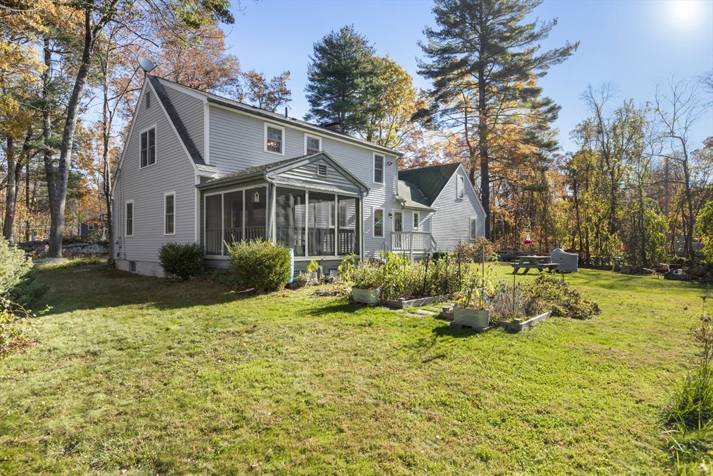 103 Uxbridge Street Douglas, MA 01569 - Photo 6 of 38 a front view of a house with a yard