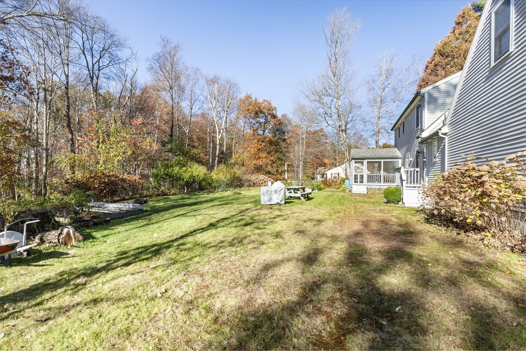 103 Uxbridge Street Douglas, MA 01569 - Photo 8 of 38 a view of road with large trees