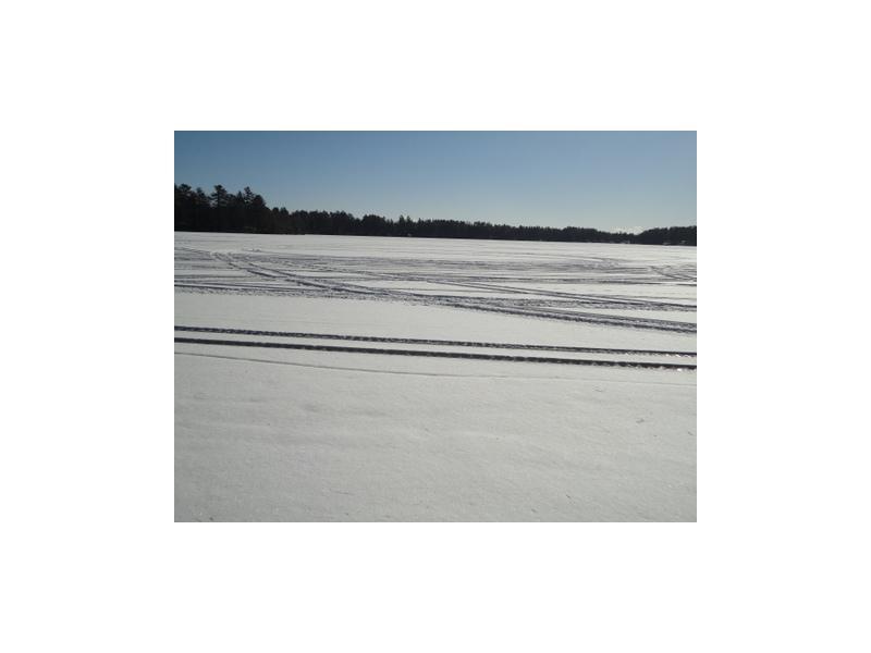 44 Shore Road Standish, ME 04084 - Photo 8 of 11 Exterior Front. Winter view onto...