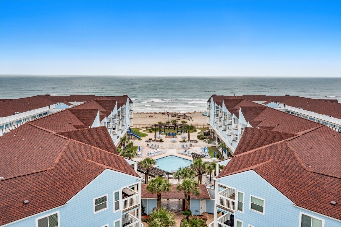 10811 Termini-San Luis Pass Road, Unit 1307 Galveston, TX 77554 - Photo 3 of 28 an aerial view of a house with a ocean view