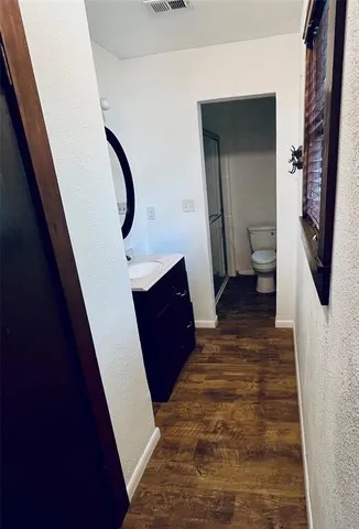 a view of a hallway view and staircase